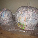 Couple layers of papier-mache on pumpkins