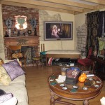 The Living Room with Ergelise's portrait and the copper Verdigris shield