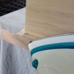 Ironing the veneer tape in place