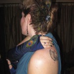 Hand-embroidered peacock glove, hair fascinator and even a tattoo!