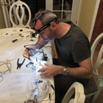 Chief Engineer Glen soldering & rewiring the fiber-optic cloak