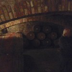 Barrel storage in the dark arched hallways
