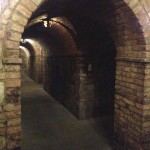 Dark arched hallways throughout the castle