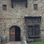 Antique grape press at the castle side entrance