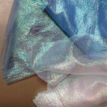 Iridescent translucent crinkle fabric in blue & white