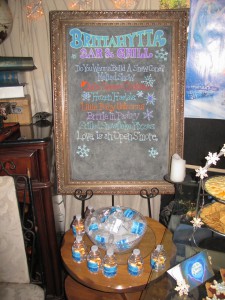 Menu chalkboard with bottles of Melted Snow