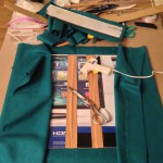 Covering the book with teal linen leftover from Elsa