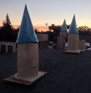 finishing the castle spires at sunset