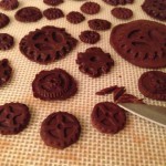 Trimming the edges of the push-molded chocolate gears