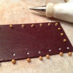 Rivets added for spacing before handcarving the birthday sign