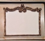 Gum paste screen with final gilded chocolate border
