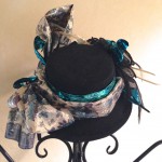 Daylight photo of my black fascinator dressed up for New Year's Eve