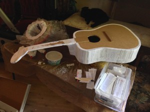 Papier-mâché guitar in process