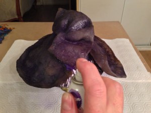 Purple food coloring spray gives unfrosted baked dough a velvety fabric texture