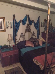 Updated Castle Modern bedroom decor with new teal crushed velvet swag