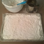 Homemade marshmallows spread and dusted