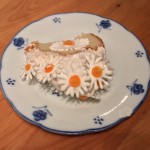 Serving the Delicious Daisies Cake
