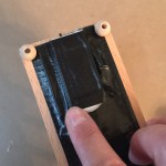 Hiding the battery pack under a duct tape hinge