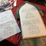 Carving the new epitaphs using my woodburning tool on a dimmer switch