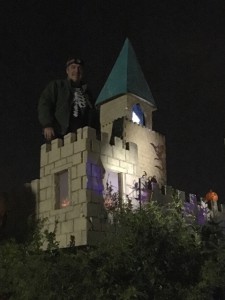 Ghoulish Glen and the Ghostly Guardian watches over the jack o' lanterns in the windows and along the castle rampart walls